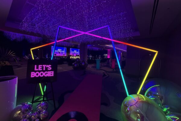 LED tunnel entrance hire Auckland with mirror balls and disco lighting by PartyCrate