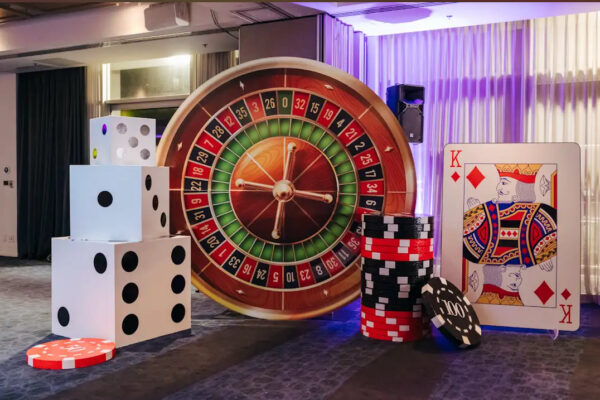 Las Vegas theme hire Auckland with roulette wheel giant dice and jumbo playing card props