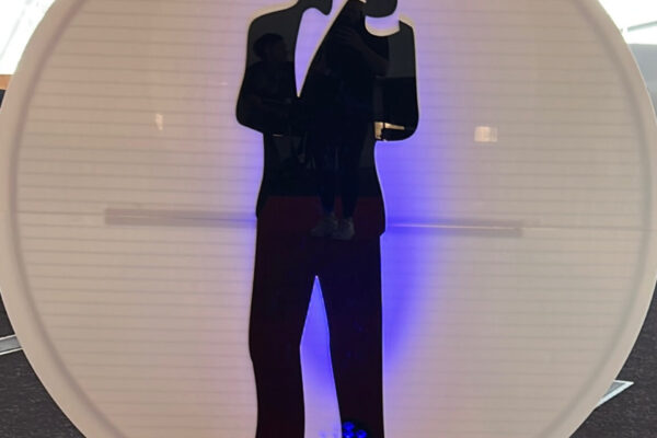 Gun Barrel entrance prop with Bond silhouette and red carpet for casino theme hire in Auckland