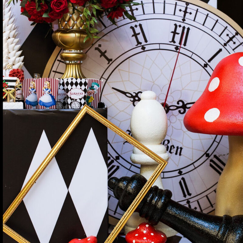 Alice in Wonderland Event Decor - PartyCrate Auckland Alice in Wonderland themed event decor with giant clock, mushrooms and whimsical styling by PartyCrate Auckland